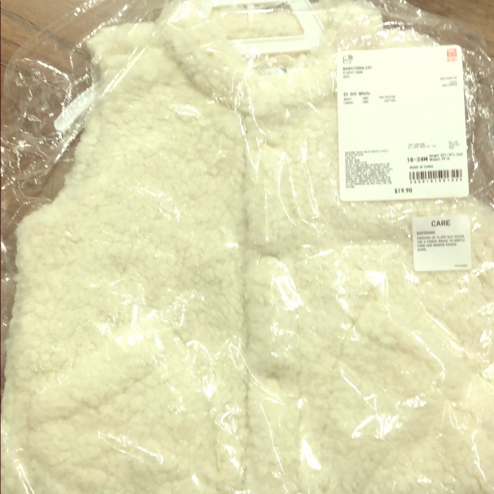 Fluffy white vest-brand new